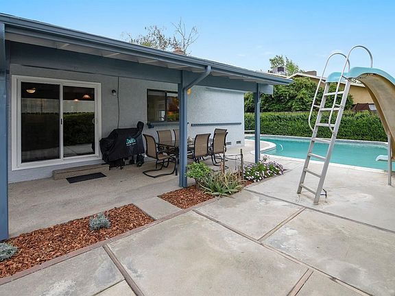 Dinner on the patio?  A handy pass-through shelf is located at the kitchen window.  There's lots of patio space for entertaining or relaxing!