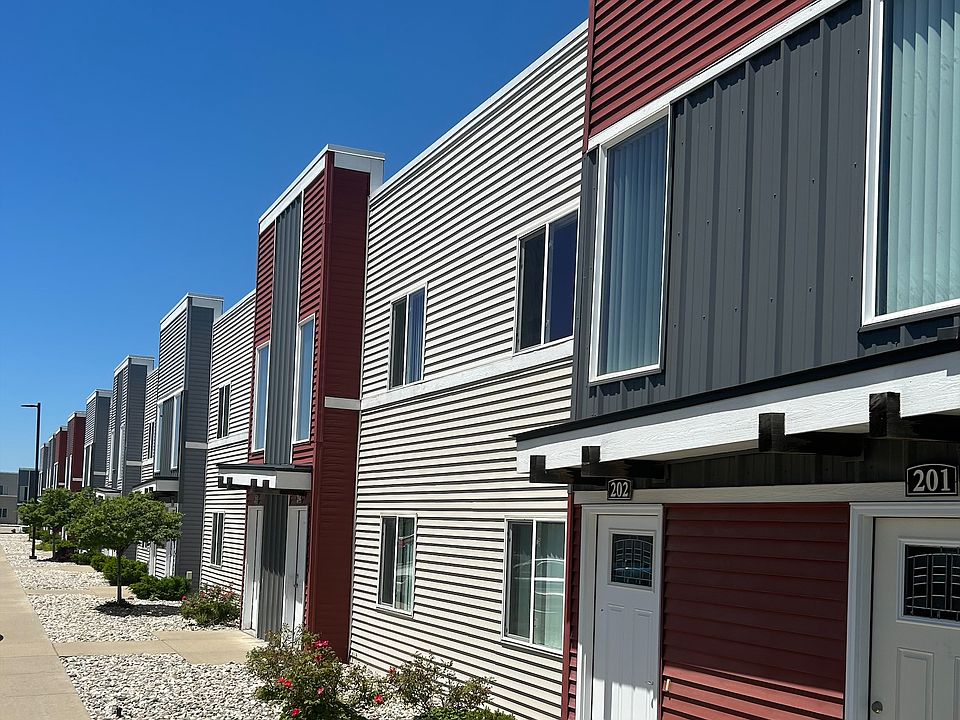 Front of buildings. Each apartment has their own exterior private entrance.