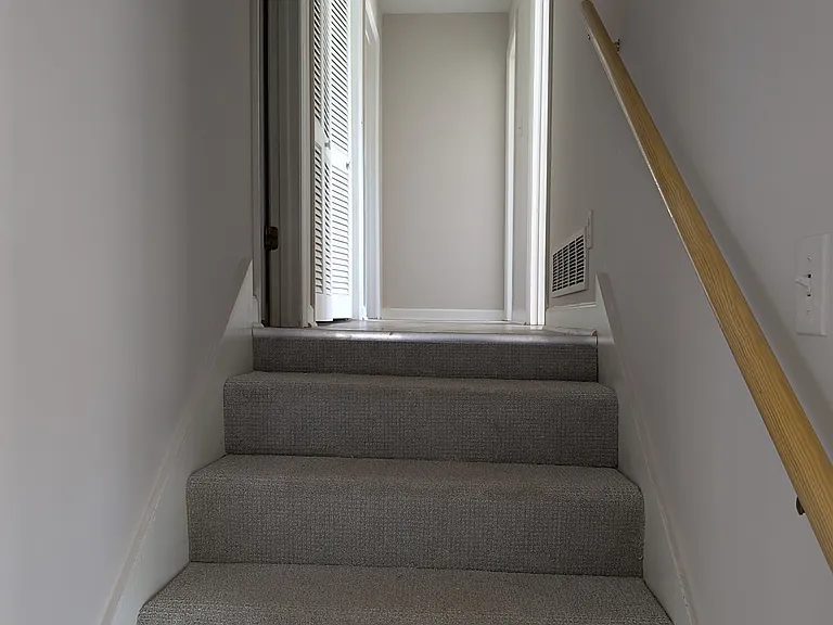 Stairs up to the bedrooms