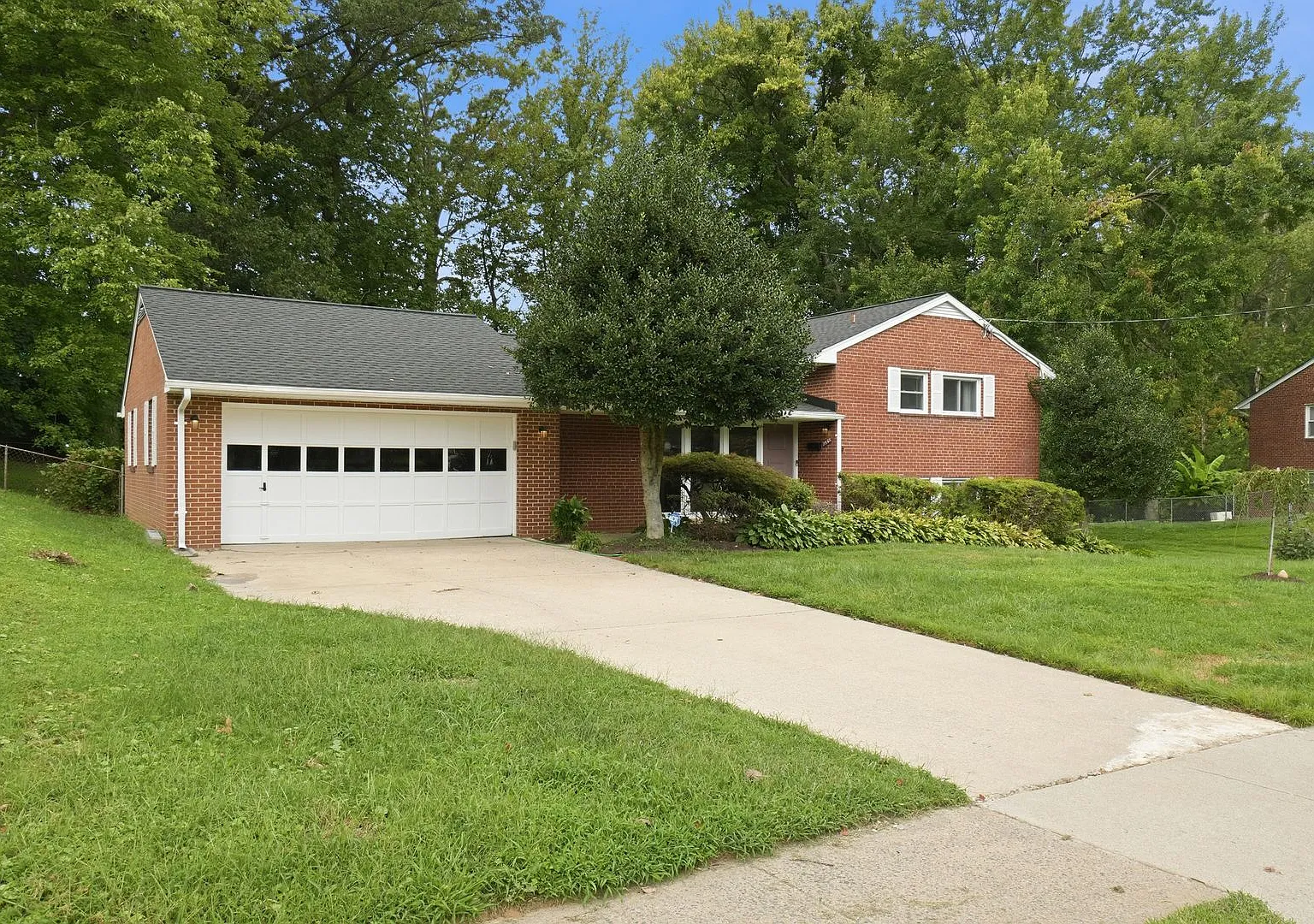 This beautifully maintained 4-bedroom, 2-bath single-family home offers generous living space, an... — Photo 2