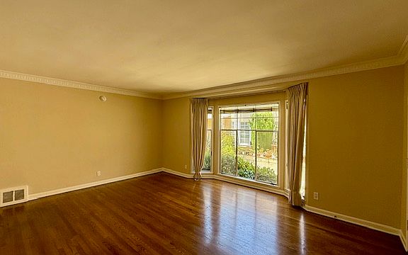 Main Living Space w/ Shiny Hardwood Floors