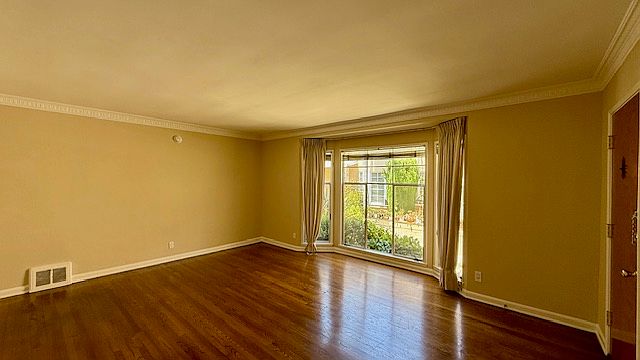 Main Living Space w/ Shiny Hardwood Floors