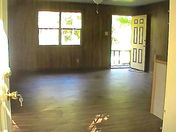 Entry thru back door looking into living area