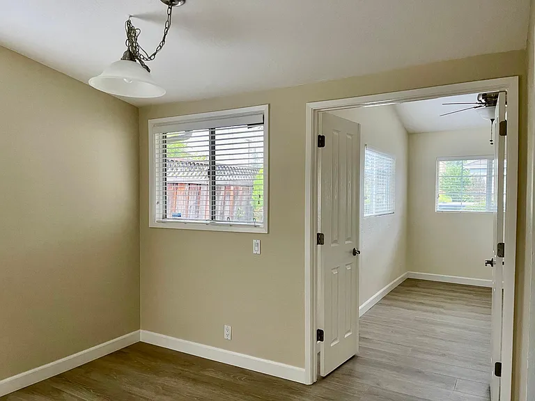 Entrance into one of the bedrooms with bath