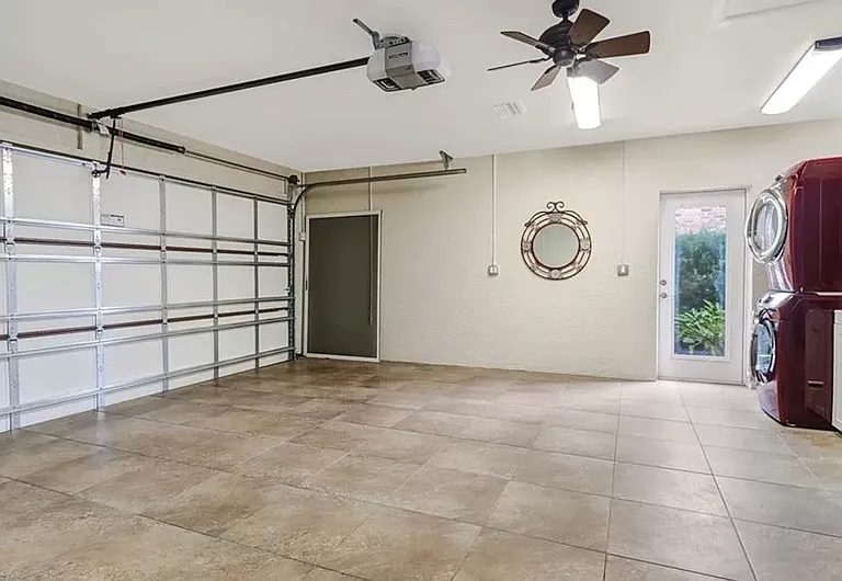 Large Air Conditioned Tiled Garage!
