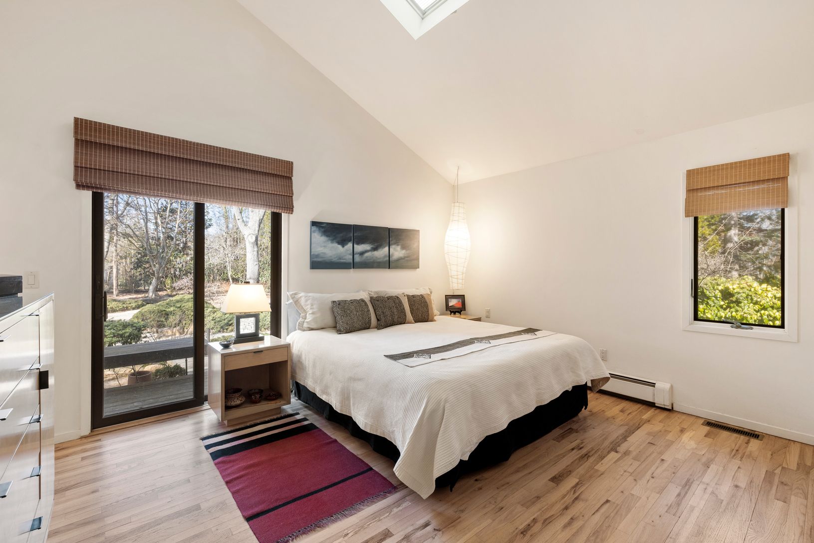  Primary Bedroom on first floor with vaulted ceilings