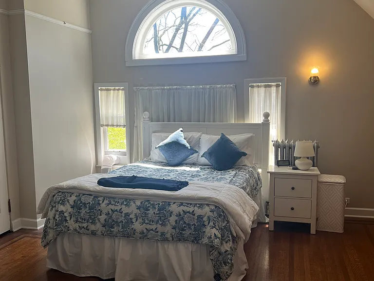 Main Bedroom facing South with Queen bed. All furnishings included