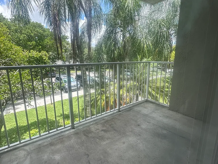 5011 Wiles Rd #207 — Photo 31