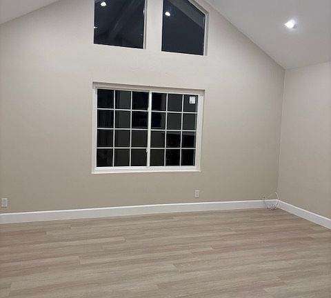 living room with high ceiling