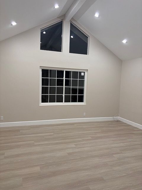 living room with high ceiling