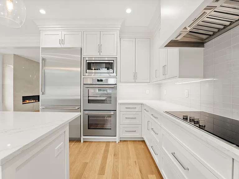 GOURMET KITCHEN w/Custom Cabinetry, Quartz Countertops, Thermador Appliances, Double Ovens, Breakfast Island