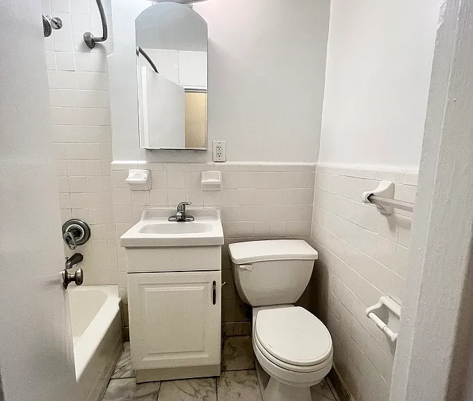 327 E 54th St #3A — Photo 9
