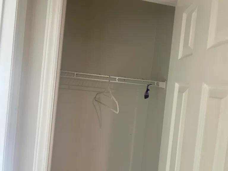 Spacious coat closet in hallway