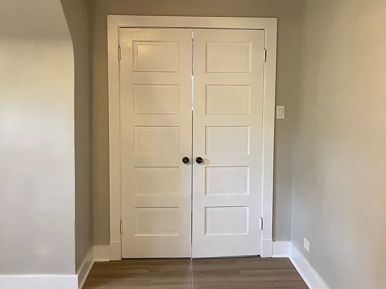Primary Bedroom, Doors Closed on Walk-in Closet
