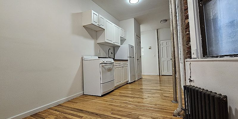 1st image of 409 W 48th St APT 2FE