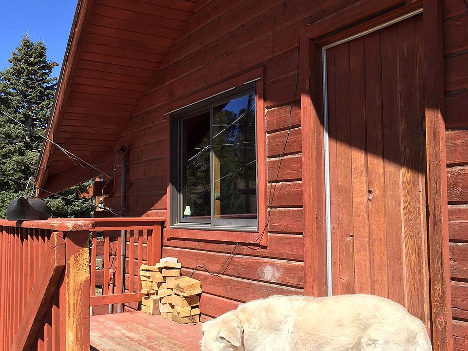 FRONT DOOR TO THE LOG HOME 2ND STORY APARTMENT! ALWAYS SUNNY AND WARM!