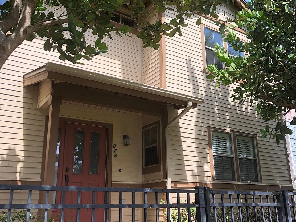 Front guest entrance from a common area park. 2 stall parking in the back of the house.