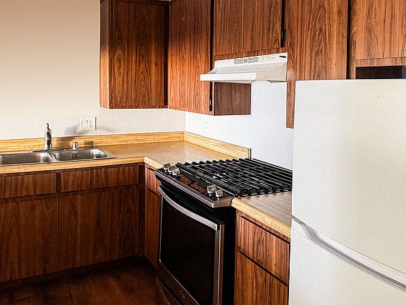 Updated appliances complete the kitchen, accommodating each mealtime.