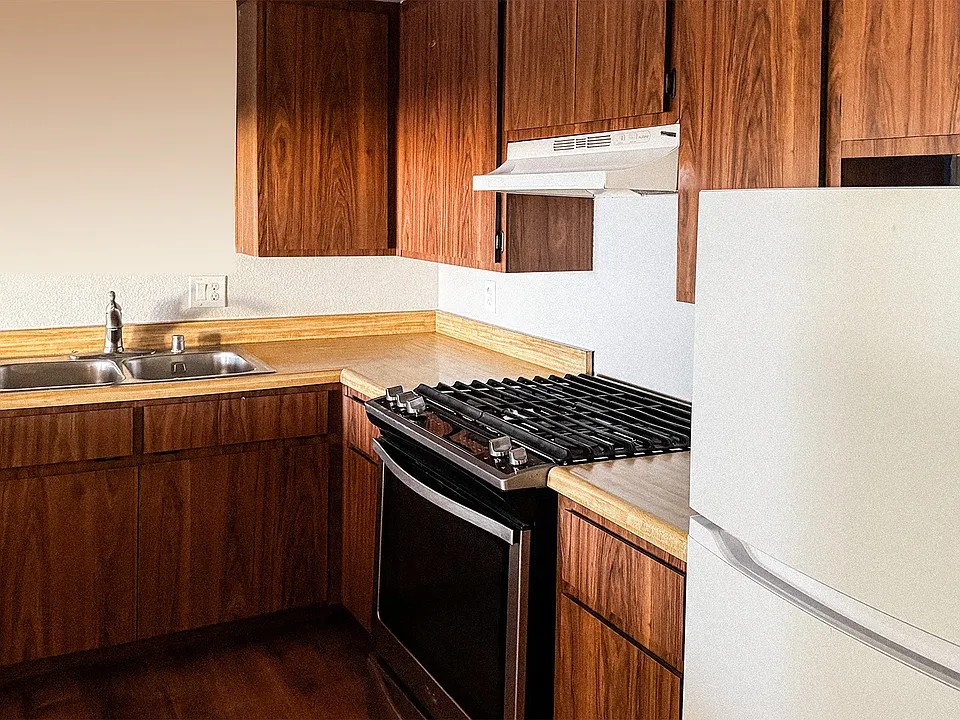 Updated appliances complete the kitchen, accommodating each mealtime.