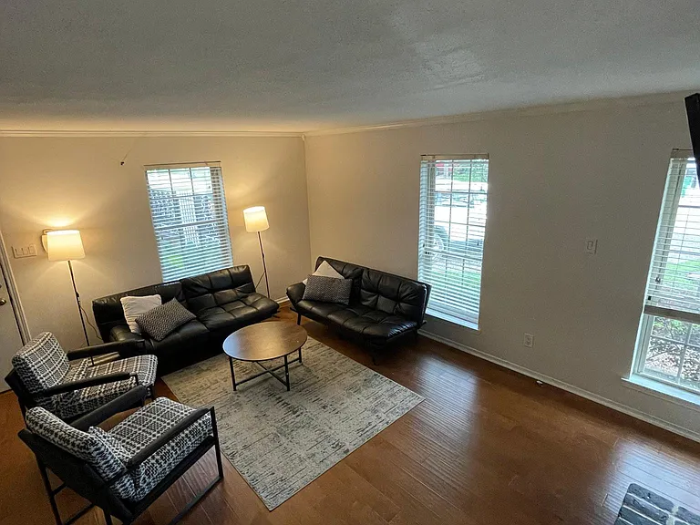 Another view of the downstairs living room.