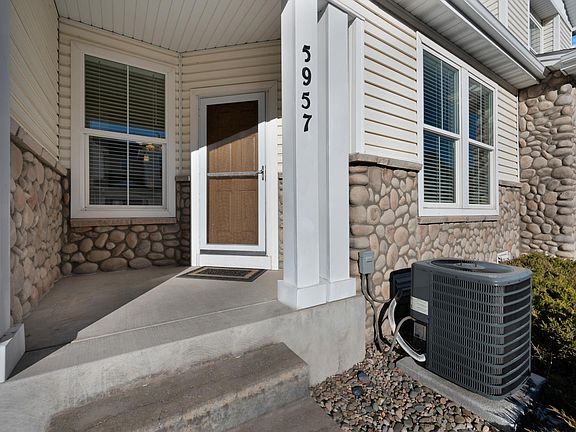 Relax On Your Front Porch. Complex Has Nice Grassy Area With Attractive Lamp Posts In Front