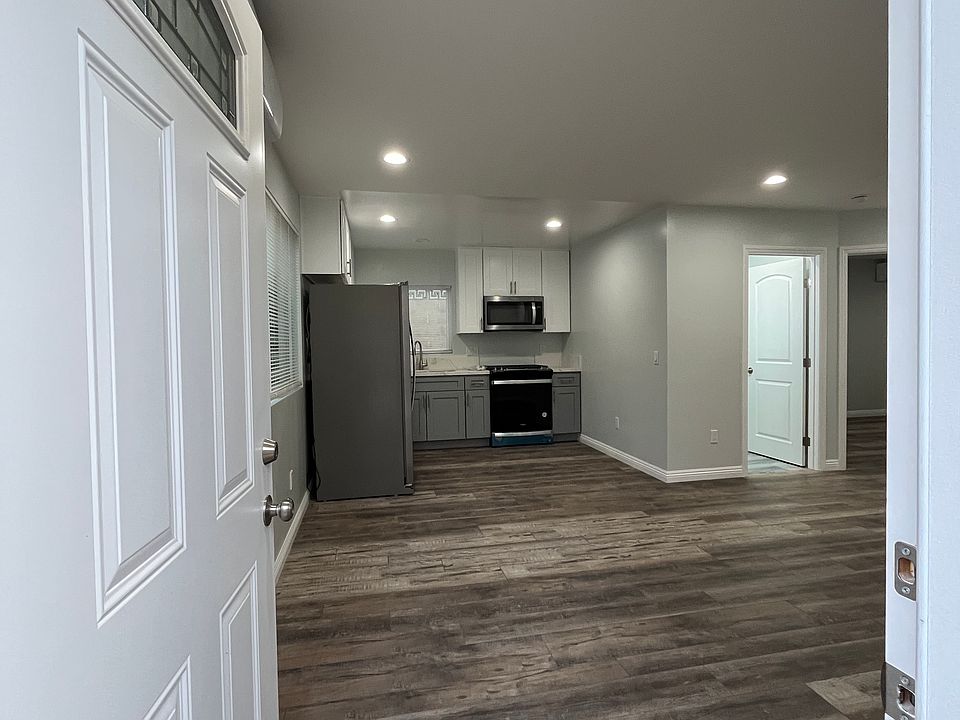 Opening into living room and kitchen.
