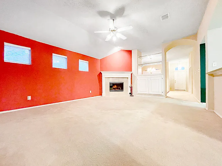 Living Room with Fireplace and Open Concept Kitchen