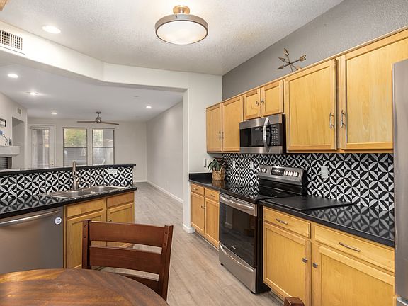 5th image of 15221 N Clubgate Dr Unit 1148