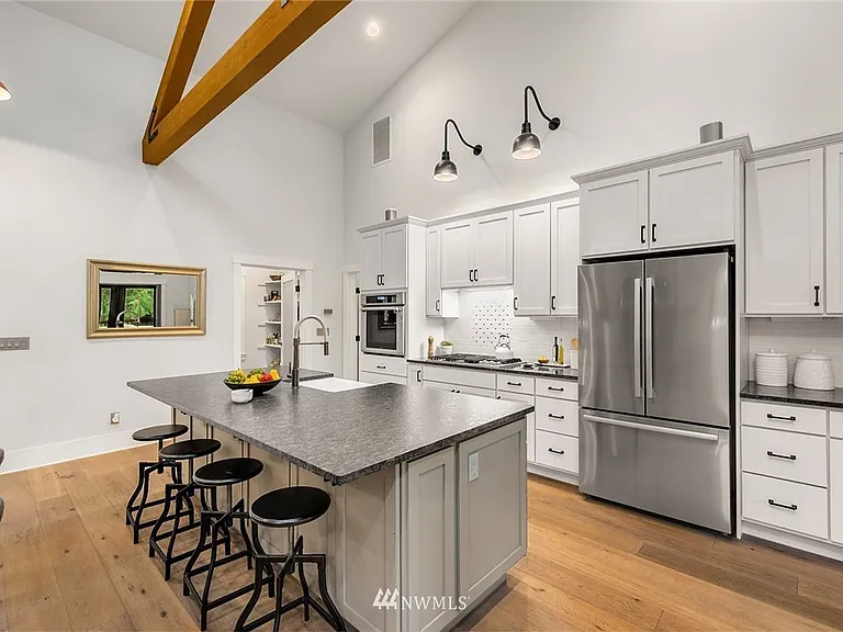 9779 NE Charisma Cir — Photo 10