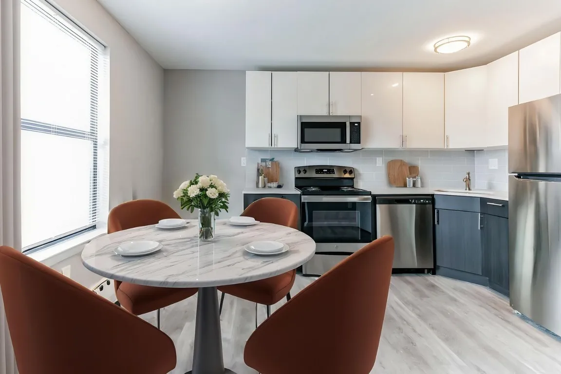 Step into modern living at Newpointe Apartments, where contemporary design meets comfort. Enjoy a stylish kitchen with high-end appliances and an inviting dining area perfect for gatherings. Schedule your tour today to see your new home!