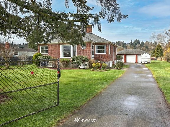 Fully fenced yard and paved driveway!