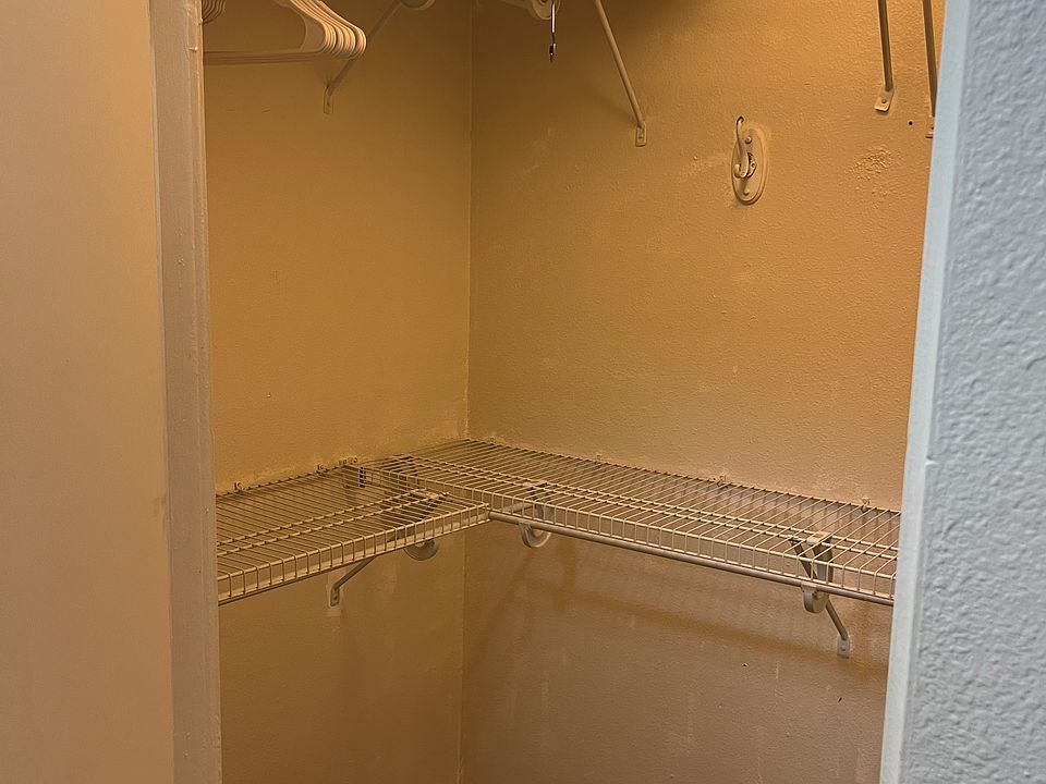 walk in closet with hangers