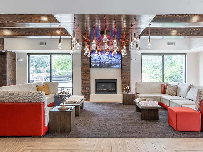 Stylish resident clubhouse with cozy lounge areas.