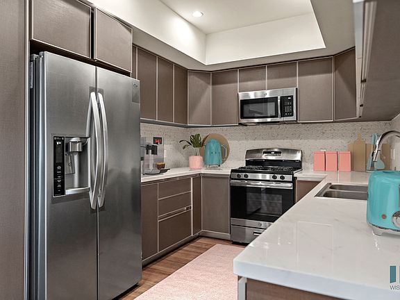 Full-Size Kitchen with Energy-Efficient Appliances and Ample Cabinet Storage