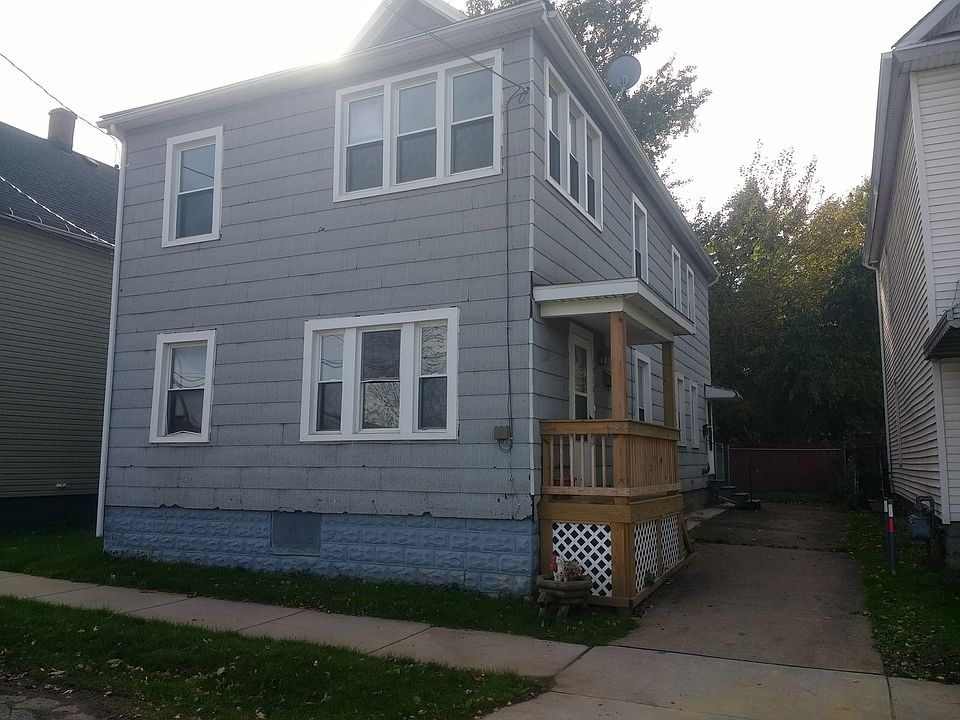 Outside view of house. Driveway is for upstairs apartment only.