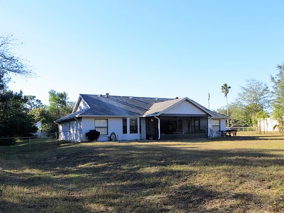 Back of home with HUGE yard.