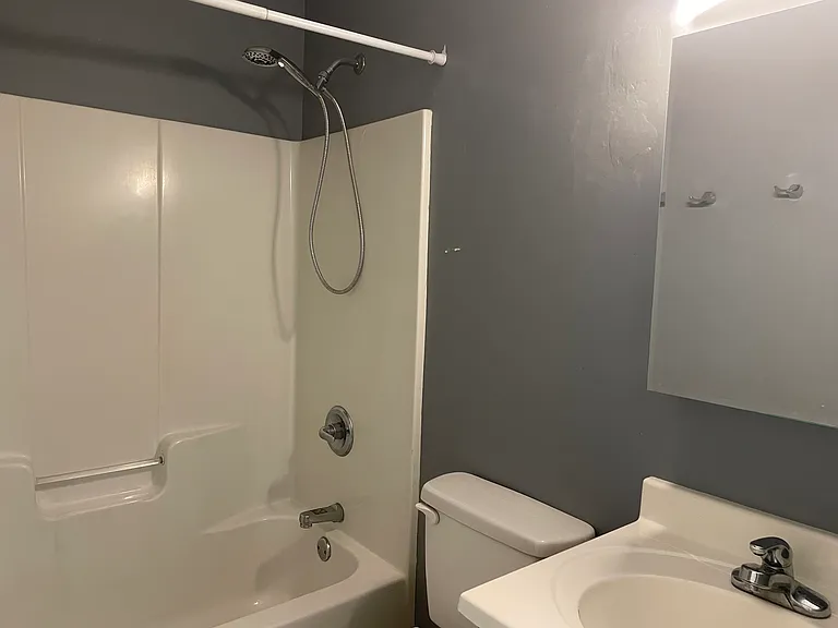 Nice bathroom with full-sized tub/shower combo and mirrored medicine cabinet for great storage