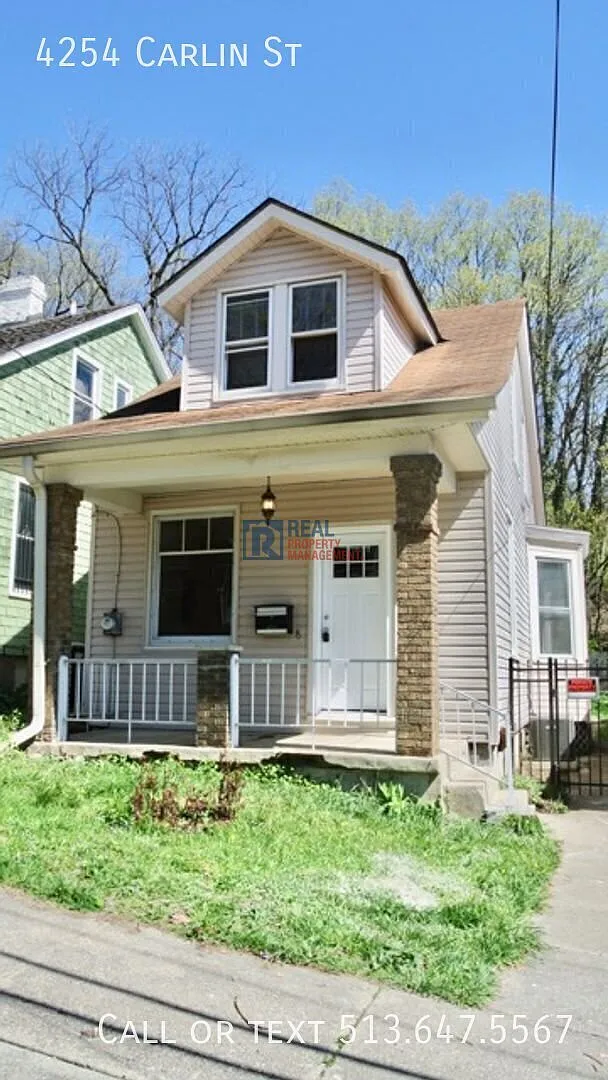 Practical 2BR Home with Hardwood Floors — Photo 1