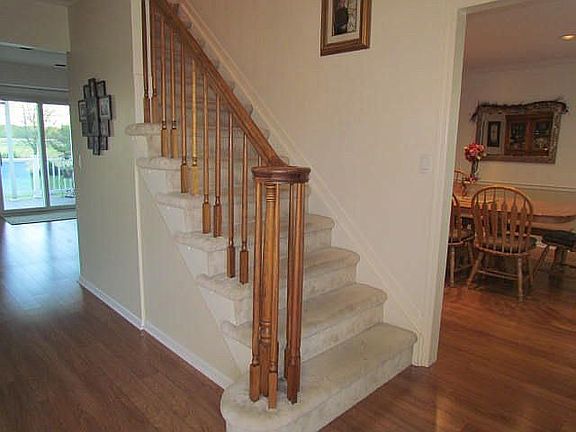 Entryway foyer, formal dining room, breakfast area, back deck