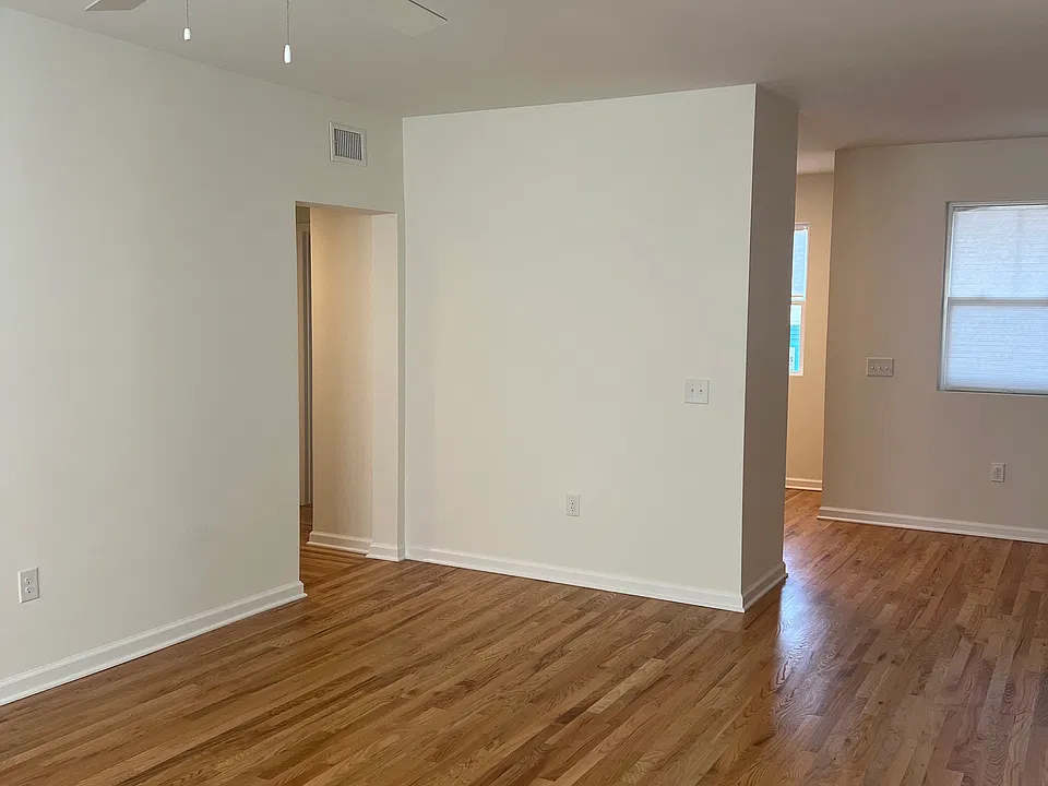 Living room view to dining , hall, kitchen to back left