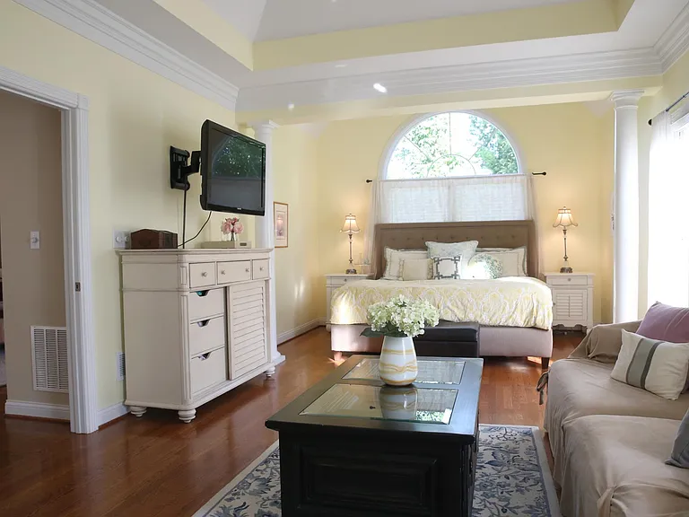 Spacious master suite with cozy sitting area