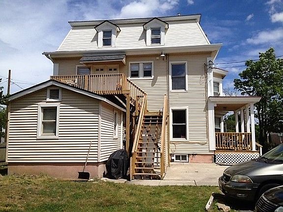 Stair entrance to 2nd and 3rd Floor apts, parking along Reading Ave side.