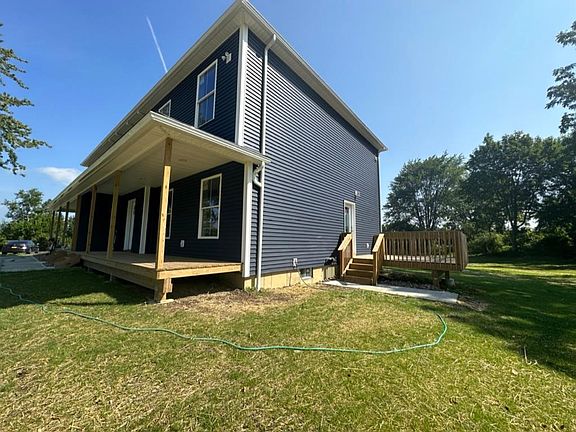 Unit #2 side private porch. Front porch with a divider to allow privacy to each renter.