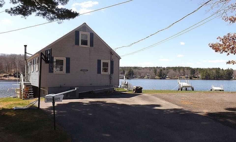 Front of House and driveway. It_s on the end of a cul De sac