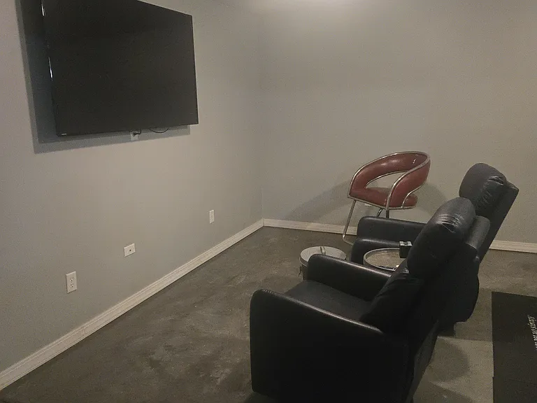 Basement: reclining chairs and TV