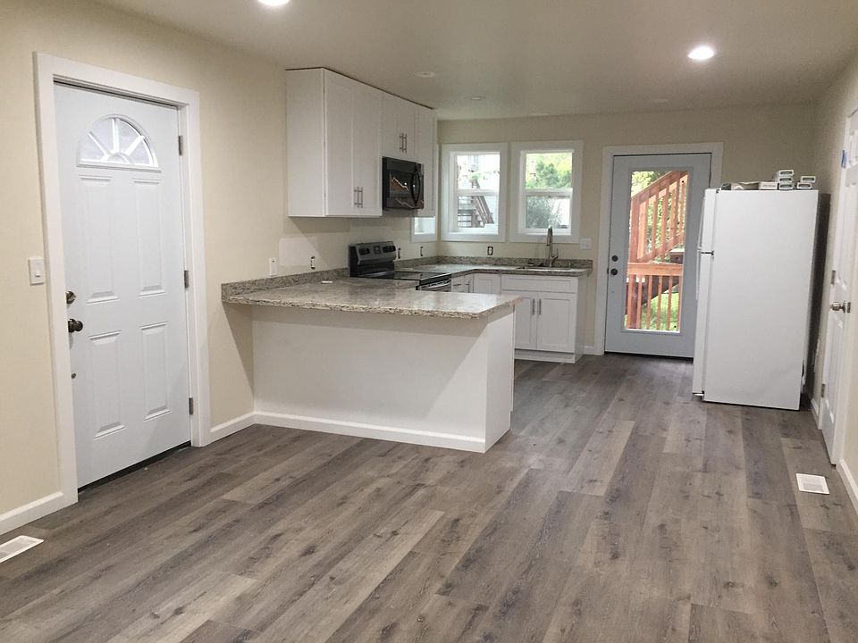 Front door and kitchen