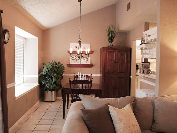 Dining room features window seat, chair rail, and bar nook w