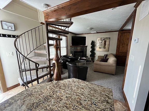 Main level, living room, stairs to access second level