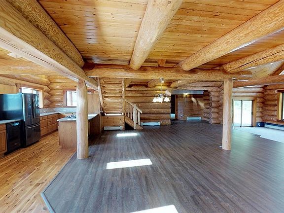 Main entrance into great room, dining area and kitchen.