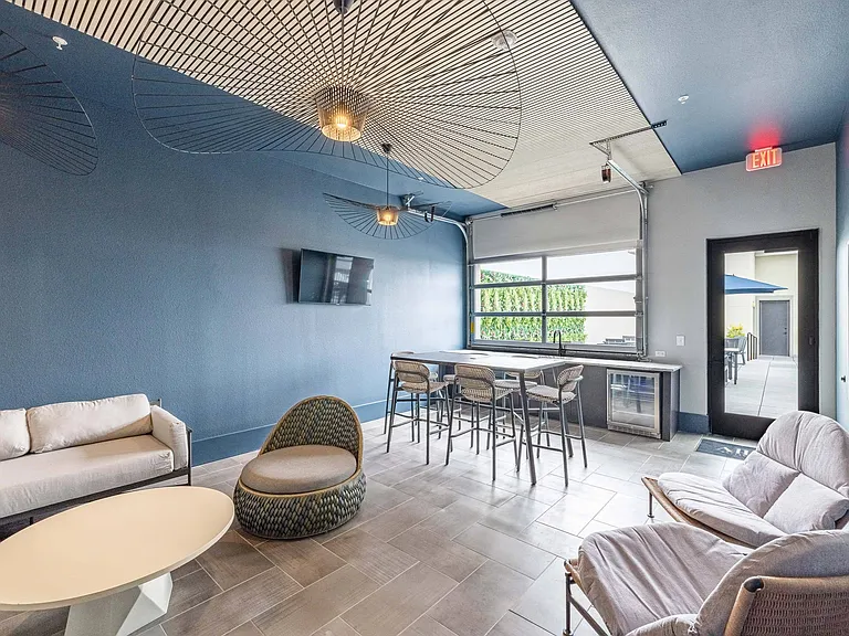 Rooftop Lounge with TVs, Kitchen & Bar Area